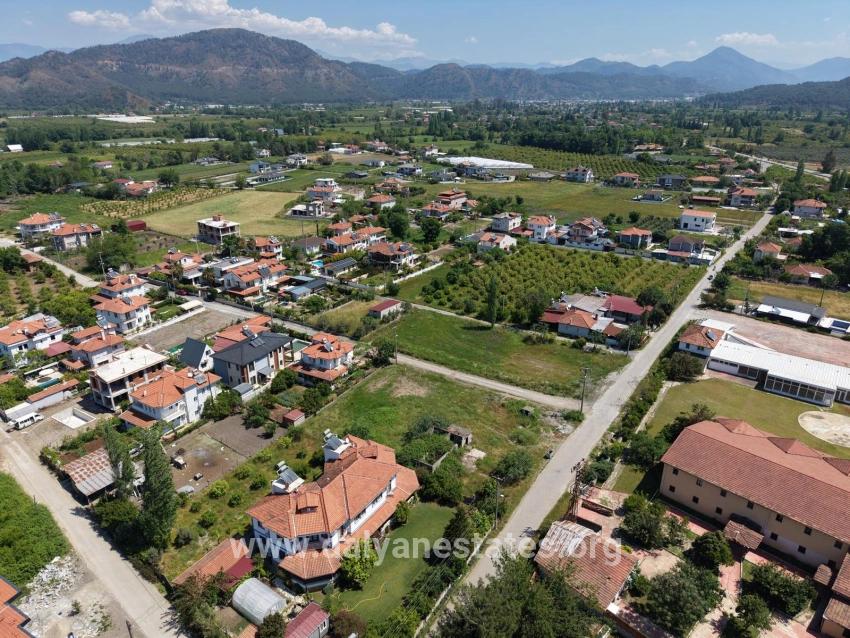 Land For Sale In Okçular, 1050m2, In The Village Residential Area.