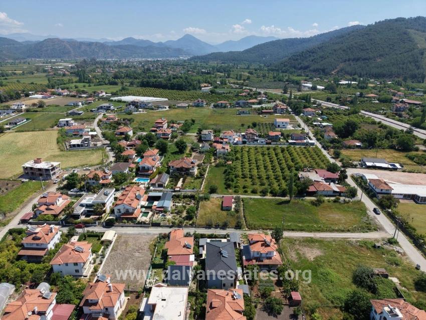 Land For Sale In Okçular, 1050m2, In The Village Residential Area.