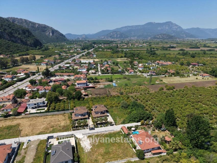 Для продажи Сюжет в Okçular Ortaca - Под Жилье застройку - 1.050 m²