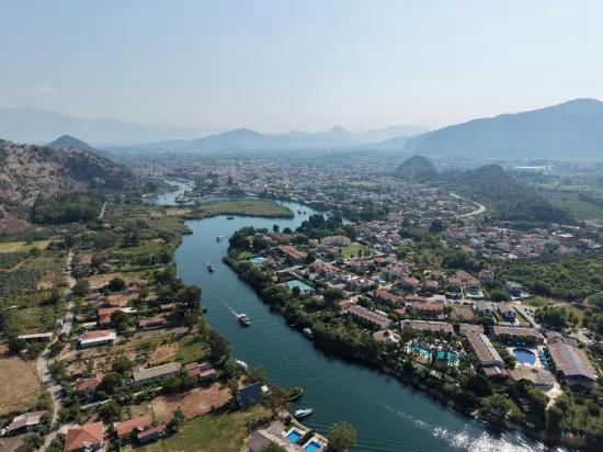 Село Köyceğiz в районе Çandır, у канала, 20.000м2 продажа поля